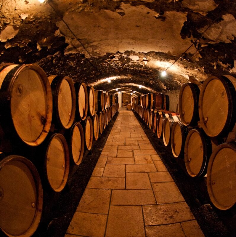 barrels of liquor in a basement