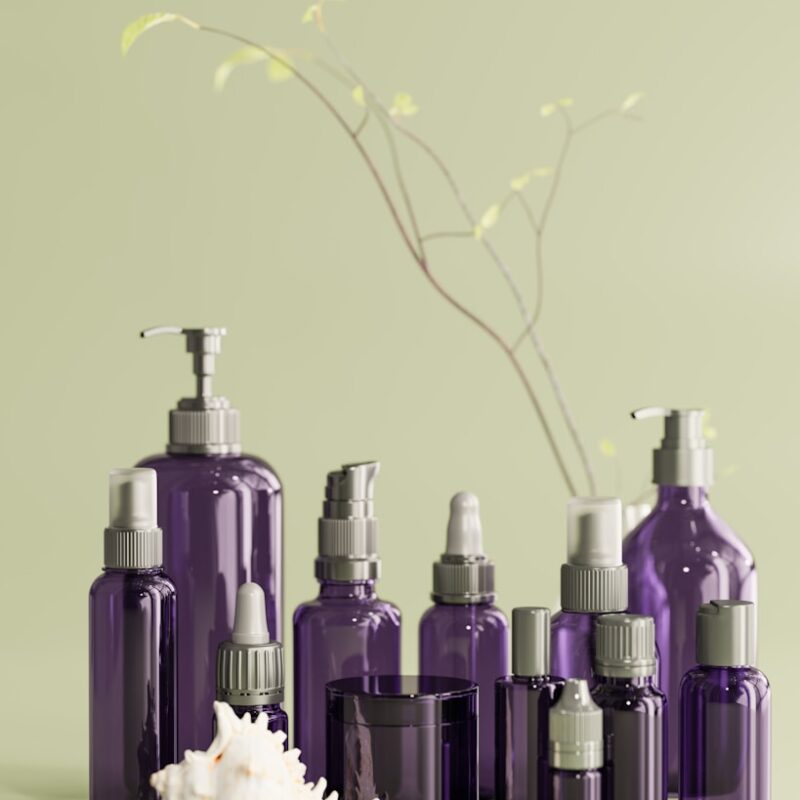 a group of purple bottles sitting on top of a table