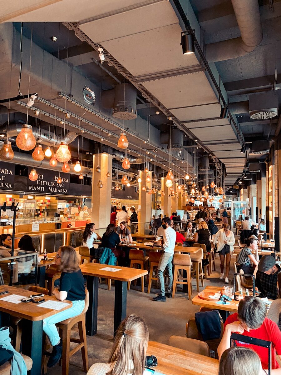 people sitting on chair in restaurant